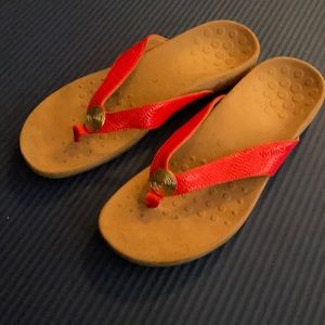 These are red, size 10 Vionic sandals